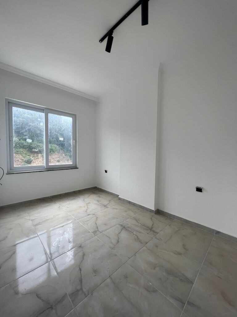 Угловая квартира 1+1 в жилом комплексе Forest Valley Avsallar — комфорт и природа рядом - Фото 14