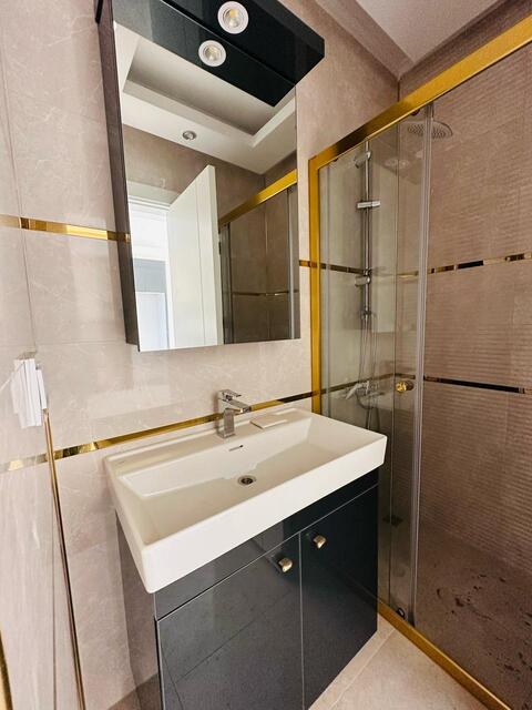 Продажа двухкомнатной квартиры 1+1 в Махмутларе, Алания, в комплексе Yekta Trade Center - Фото 6