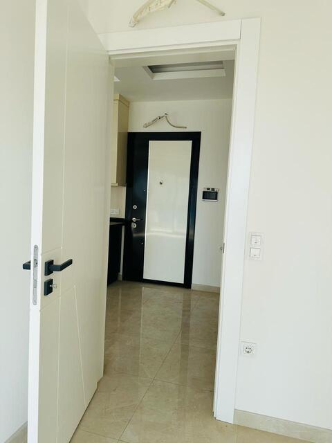 Продажа двухкомнатной квартиры 1+1 в Махмутларе, Алания, в комплексе Yekta Trade Center - Фото 14