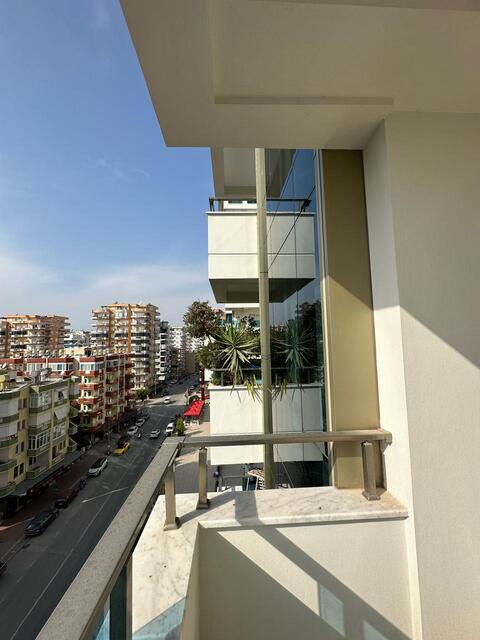 Продажа двухкомнатной квартиры 1+1 в Махмутларе, Алания, в комплексе Yekta Trade Center - Фото 21