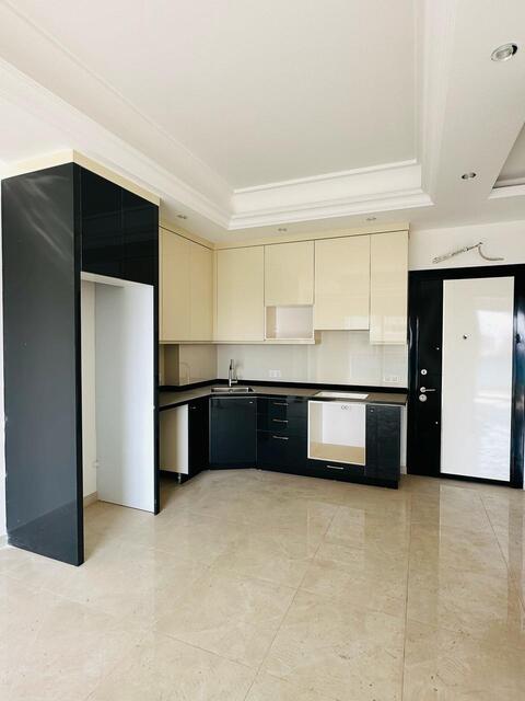 Продажа двухкомнатной квартиры 1+1 в Махмутларе, Алания, в комплексе Yekta Trade Center - Фото 26