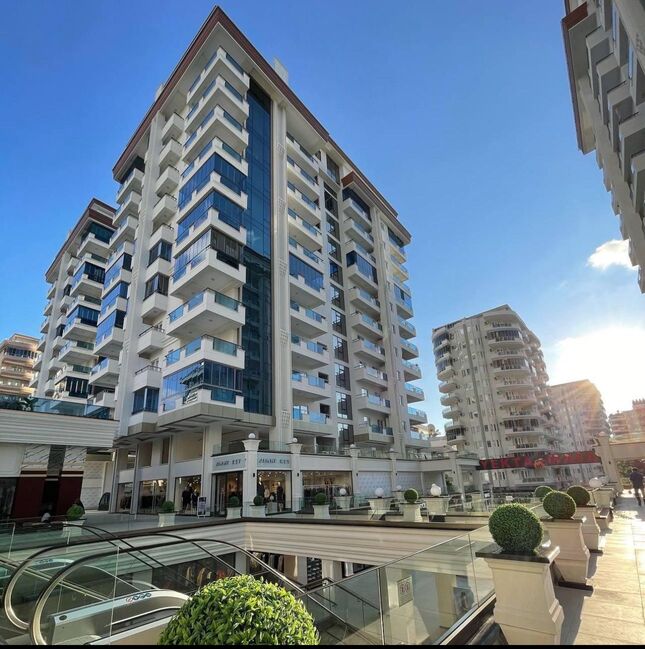 Продажа двухкомнатной квартиры 1+1 в Махмутларе, Алания, в комплексе Yekta Trade Center - Фото 3