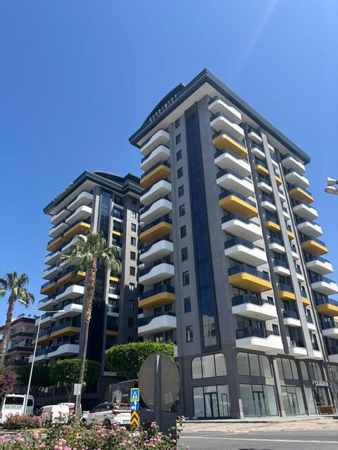 Купить квартиру в Махмутлар – двухкомнатные апартаменты 1+1 в Novus Sky, всего в 150м от моря - Фото 1