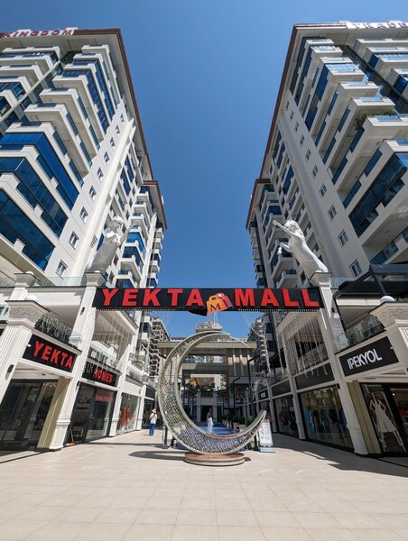 Продажа двухкомнатной квартиры 1+1 в Махмутларе, Алания, в комплексе Yekta Trade Center - Фото 2