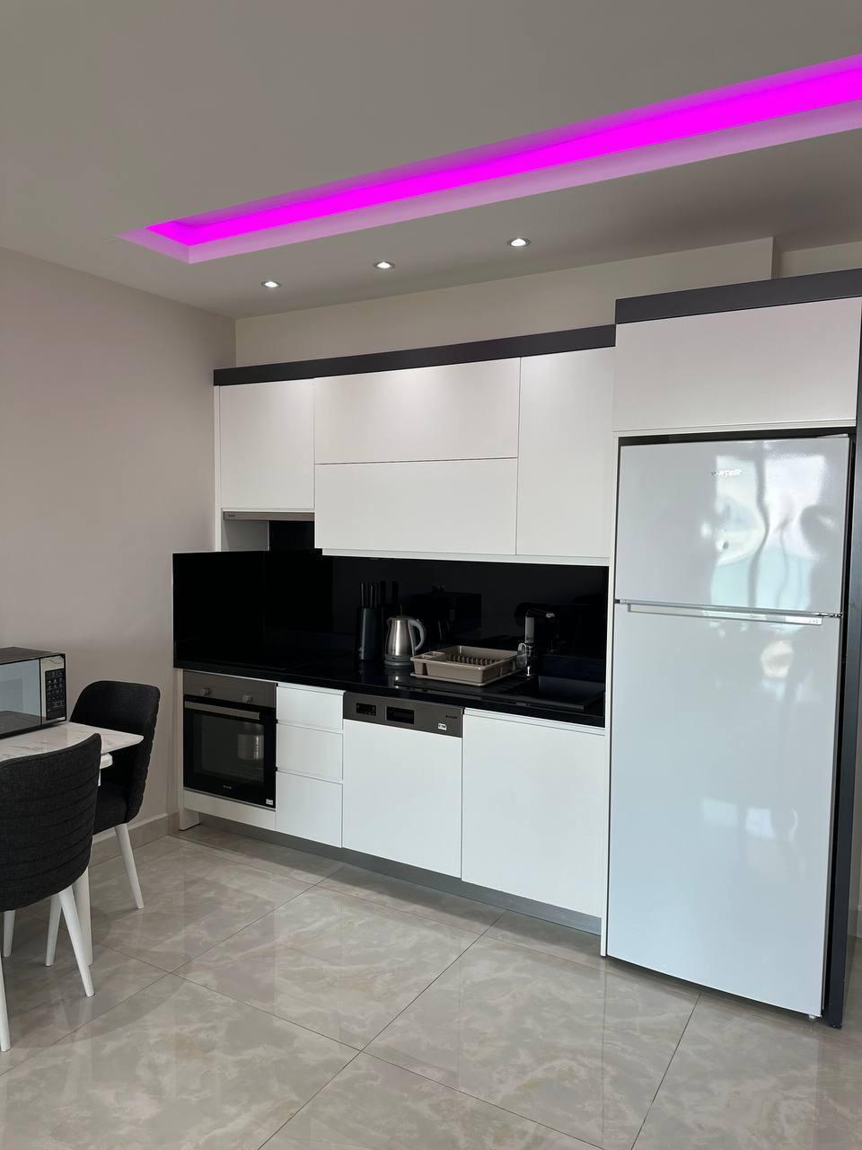 Квартира 1+1 в комплексе Konak Seaside Tower — первая береговая линия, вид на море - Фото 3