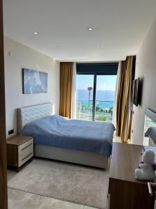 Квартира 1+1 в комплексе Konak Seaside Tower — первая береговая линия, вид на море - Фото 6