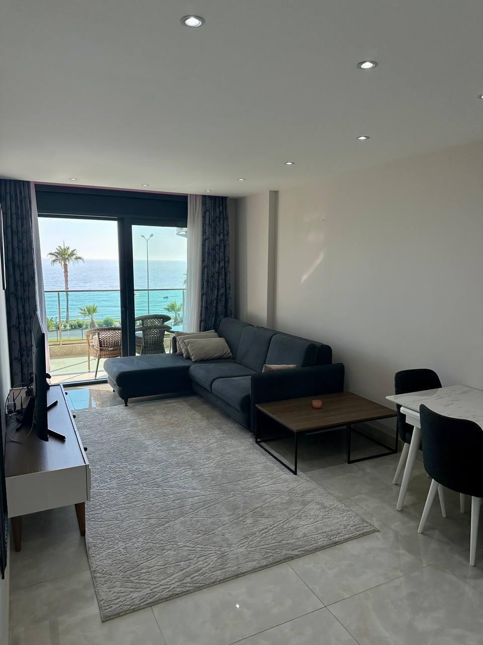 Квартира 1+1 в комплексе Konak Seaside Tower — первая береговая линия, вид на море - Фото 7