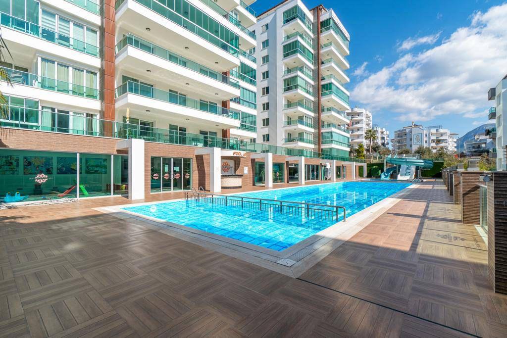 Квартира в Алании 2+1  в комплексе Sun Palace Garden район Тосмур - Фото 1