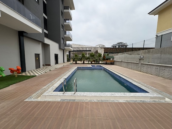 Недорогая квартира в комплексе Kurt Suite в Каргыджаке, Алания - Фото 4