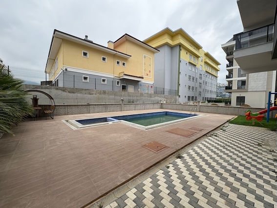 Недорогая квартира в комплексе Kurt Suite в Каргыджаке, Алания - Фото 12