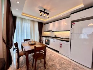 Квартира в Алании 1+1 в премиум комплексе Kucuker в Махмутларе - Фото 6