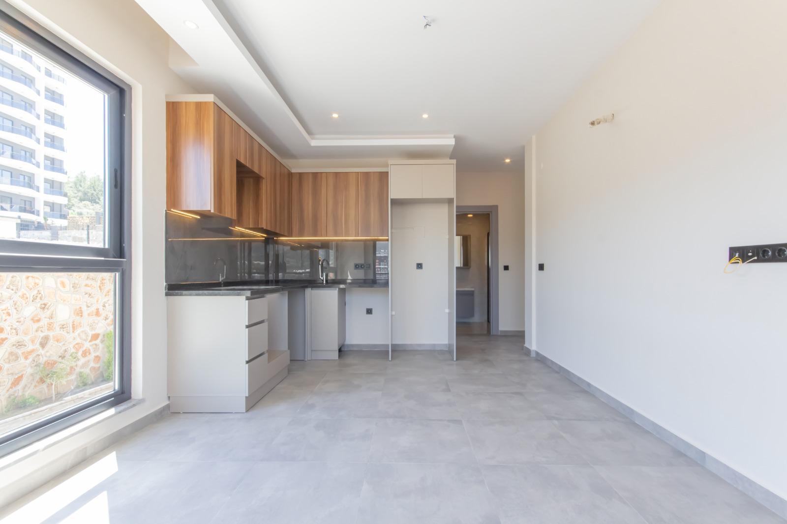 Квартира в Турции 1+1 в комплексе Toprak Shine в Демирташе, Алания - Фото 10