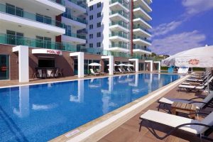 Квартира в Алании 1+1 в комплексе Sun Palace Garden в районе Тосмур - Фото 1