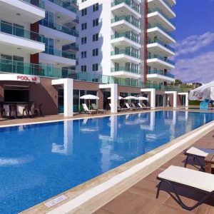 Квартира в Алании 1+1 в комплексе Sun Palace Garden в районе Тосмур