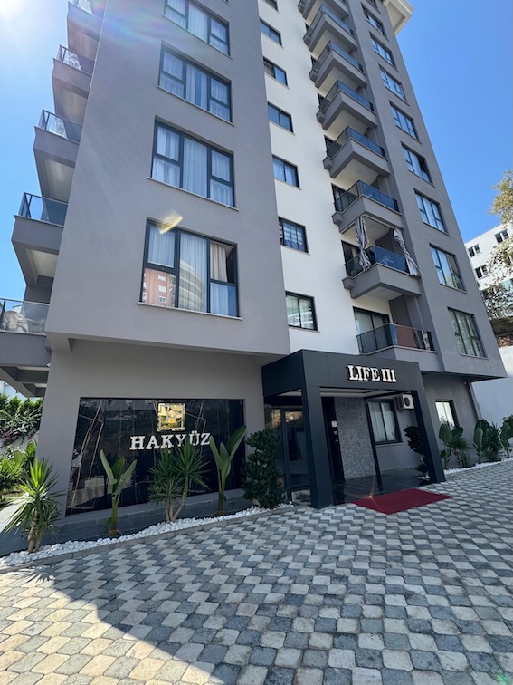 Квартира в Алании 1+1 в комплексе Hakyuz Life 3 в районе Махмутлар - Фото 2