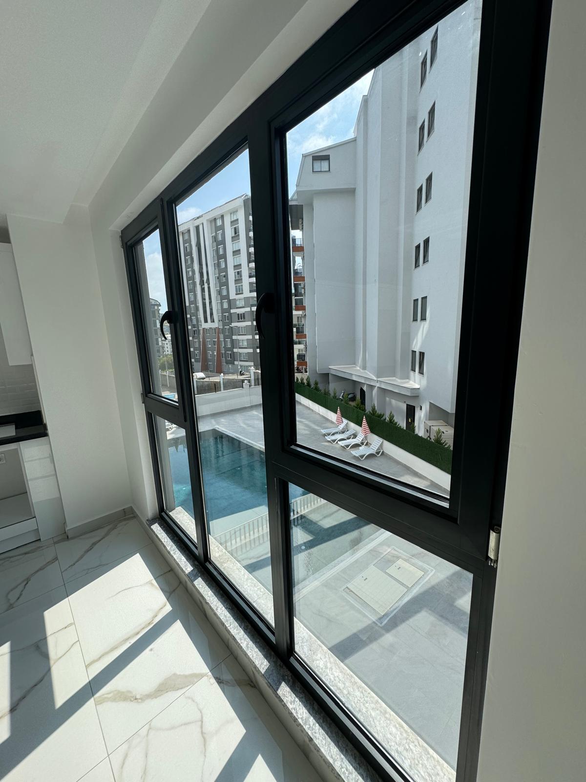 Квартира в Алании 1+1 в комплексе Hakyuz Life 3 в районе Махмутлар - Фото 14