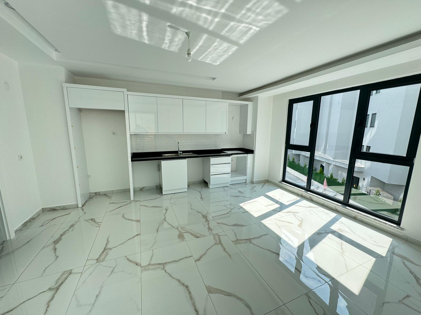 Квартира в Алании 1+1 в комплексе Hakyuz Life 3 в районе Махмутлар - Фото 10