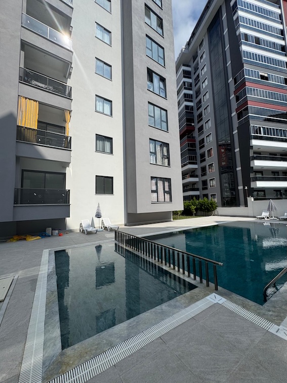 Квартира в Алании 1+1 в комплексе Hakyuz Life 3 в районе Махмутлар - Фото 3