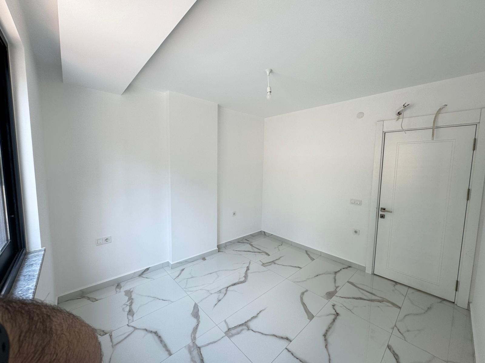 Квартира в Алании 1+1 в комплексе Hakyuz Life 3 в районе Махмутлар - Фото 17