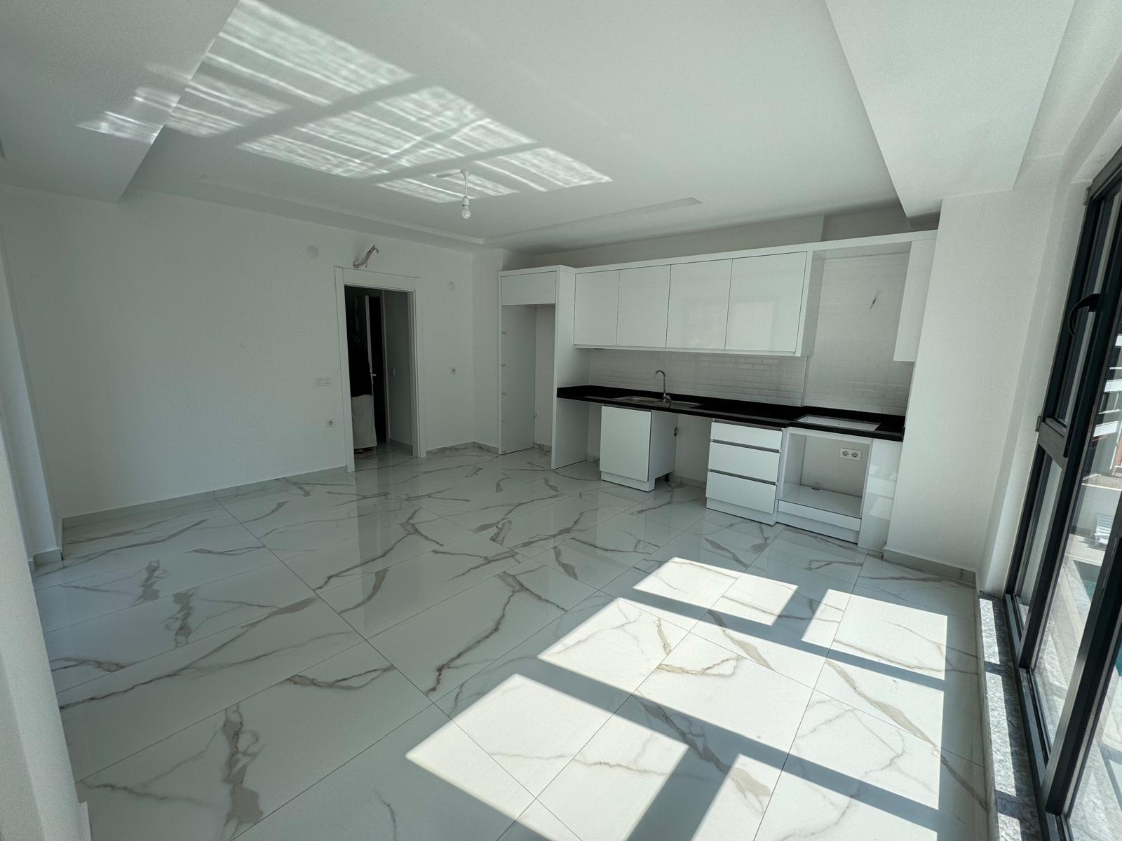 Квартира в Алании 1+1 в комплексе Hakyuz Life 3 в районе Махмутлар - Фото 13