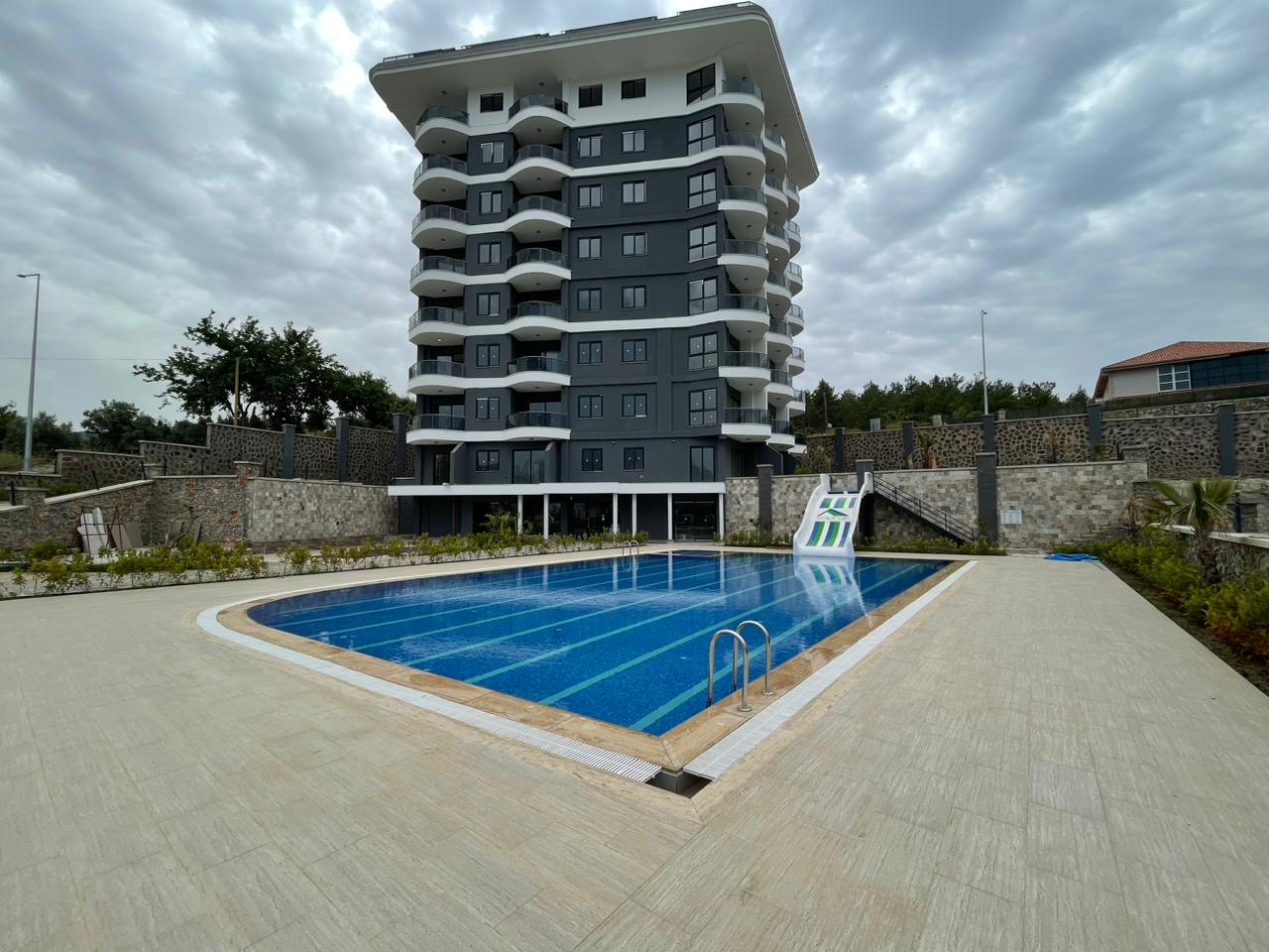 Квартира в Алании 1+1 в комплексе Toprak Shine в районе Демирташ - Фото 1