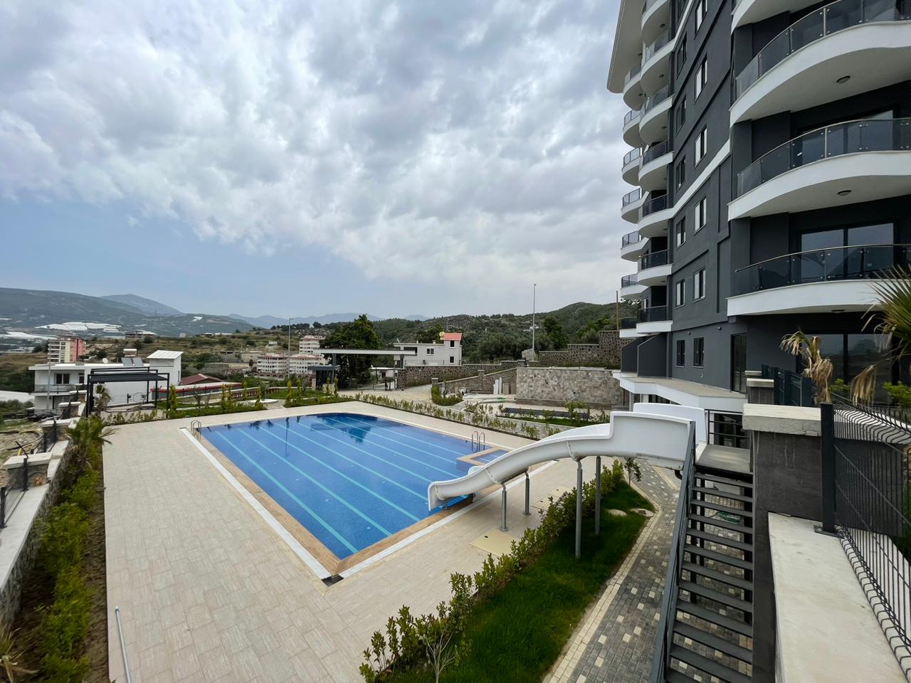 Квартира в Алании 1+1 в комплексе Toprak Shine в районе Демирташ - Фото 2