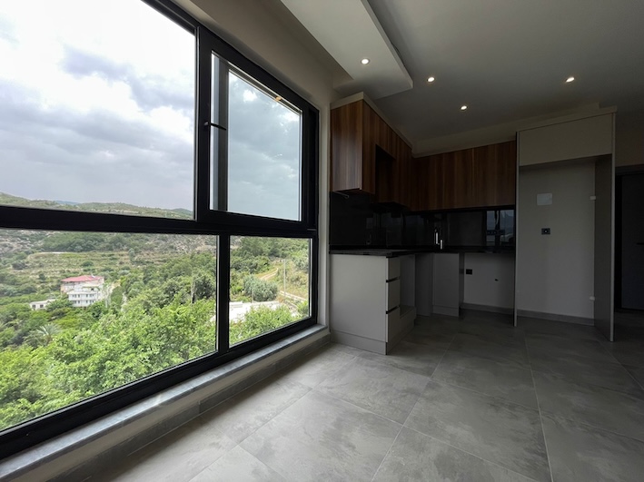 Квартира в Алании 1+1 в комплексе Toprak Shine в районе Демирташ - Фото 17