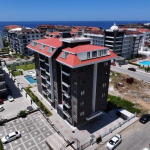 Квартира в Алании 1+1 в комплексе White Crown в районе Кестель