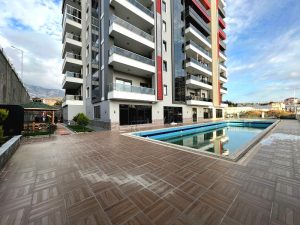 Квартира в Алании 2+1 в комплексе Guzel Tower в районе Махмутлар - Фото 2