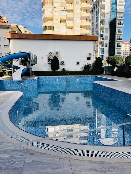 Квартира в Алании 1+1 в комплексе Atlas 4 в районе Махмутлар - Фото 3