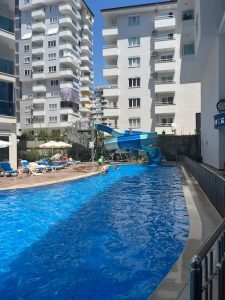 Квартира в Алании в комплексе Elite Life 5 в районе Махмутлар - Фото 2