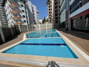 Квартира в Алании 2+1 в комплексе Guzel Tower в районе Махмутлар - Фото 11