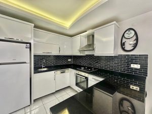 Квартира в Алании 1+1 в комплексе Sonas Life в районе Махмутлар - Фото 15