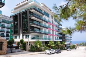 Квартира в Турции 2+1 в комплексе Konak Seaside Home в районе Каргыджак - Фото 5