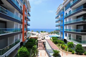 Квартира в Турции 2+1 в комплексе Konak Seaside Home в районе Каргыджак - Фото 2