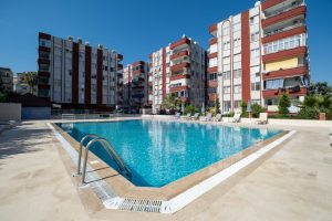 Недорогая квартира в Махмутлар 2+1 в комплексе Reyhan в Алании - Фото 1