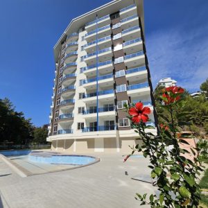 Недорогая квартира в Алании 1+1 в комплексе Aqua Blue в районе Авсаллар