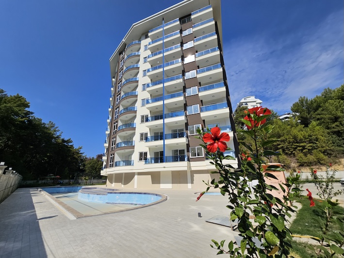 Недорогая квартира в Алании 1+1 в комплексе Aqua Blue в районе Авсаллар - Фото 1