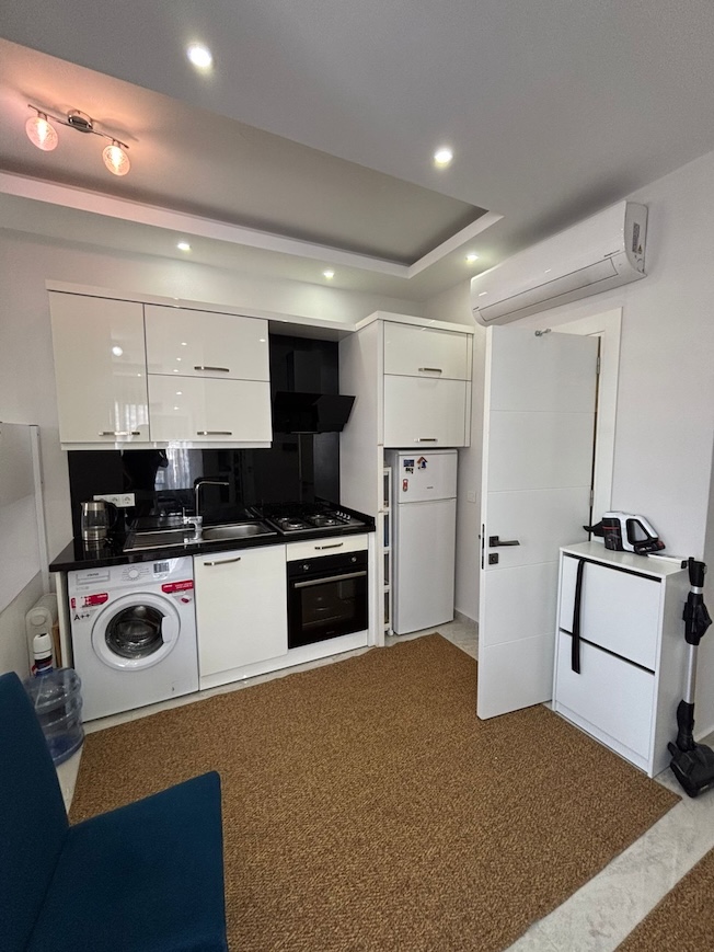 Недорогая квартира в Алании 1+0 в комплексе Seda Tower в центре города - Фото 9