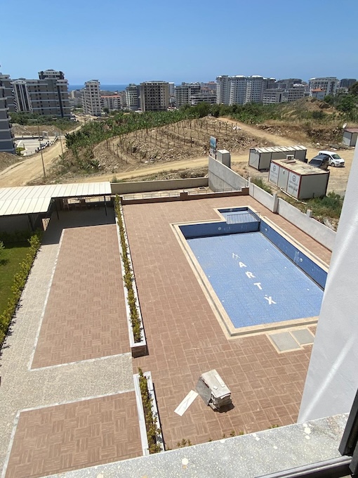 Квартира в Махмутлар 1+1 по выгодной цене в комплексе Art X в Алании - Фото 3