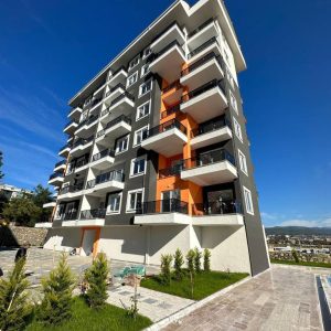 Недорогая квартира в Авсаллар 1+1 в комплексе Lotus 1 в Алании