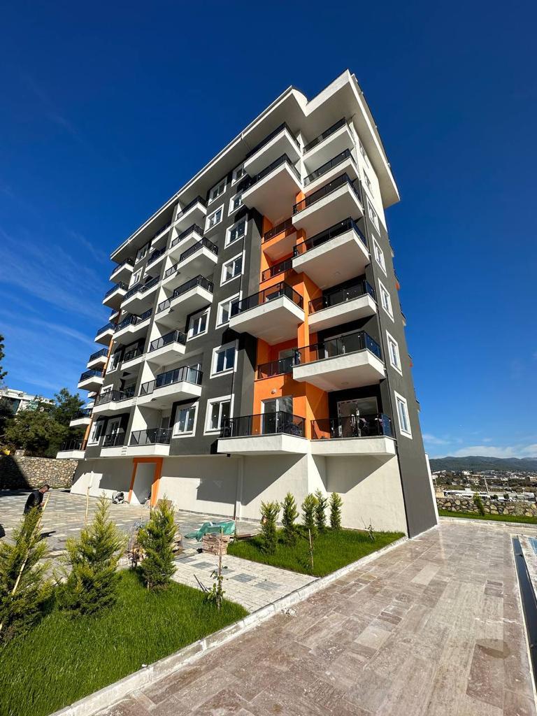 Недорогая квартира в Авсаллар 1+1 в комплексе Lotus 1 в Алании - Фото 1