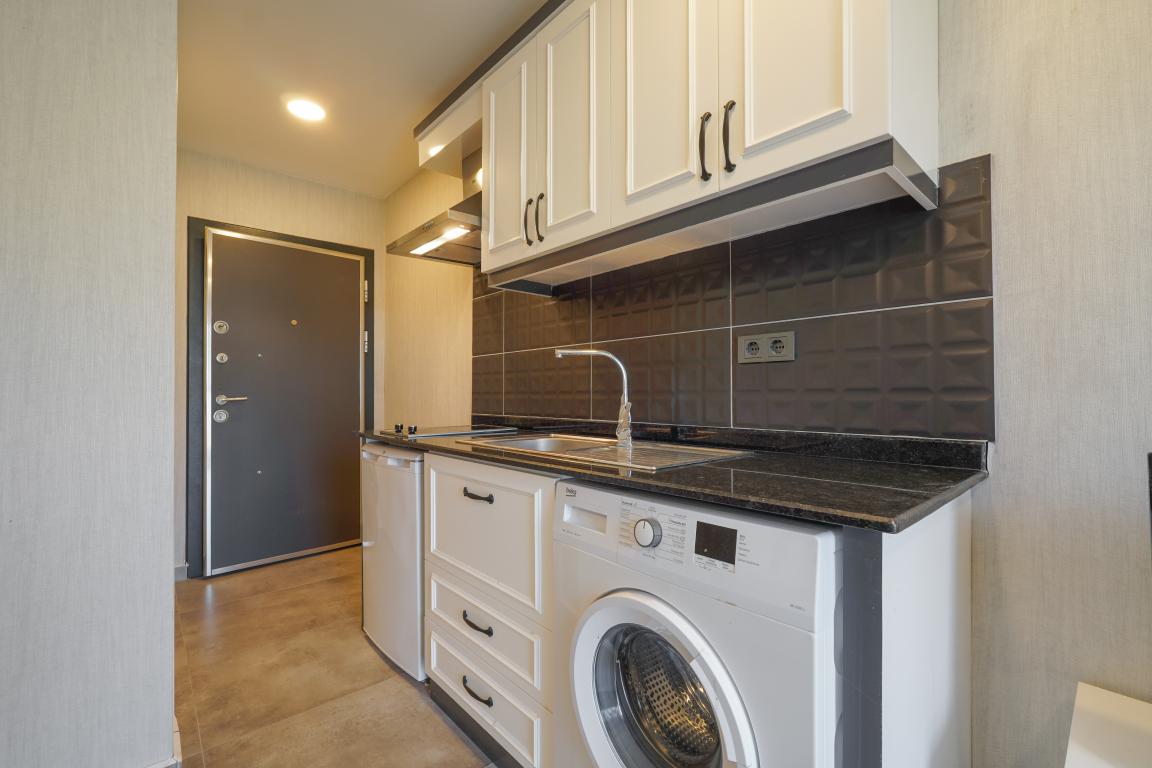 Квартира в Алании 1+0 по выгодной цене в комплексе Stay Suite в районе Каргыджак в Турции - Фото 11