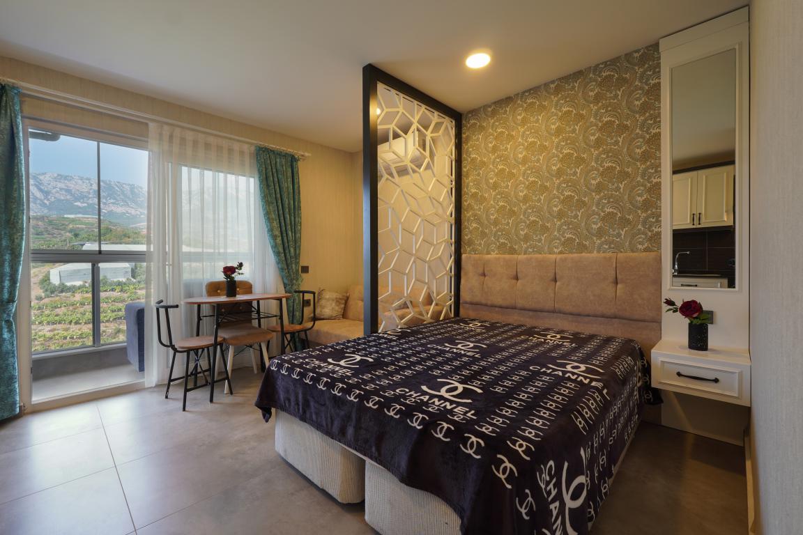 Квартира в Алании 1+0 по выгодной цене в комплексе Stay Suite в районе Каргыджак в Турции - Фото 13