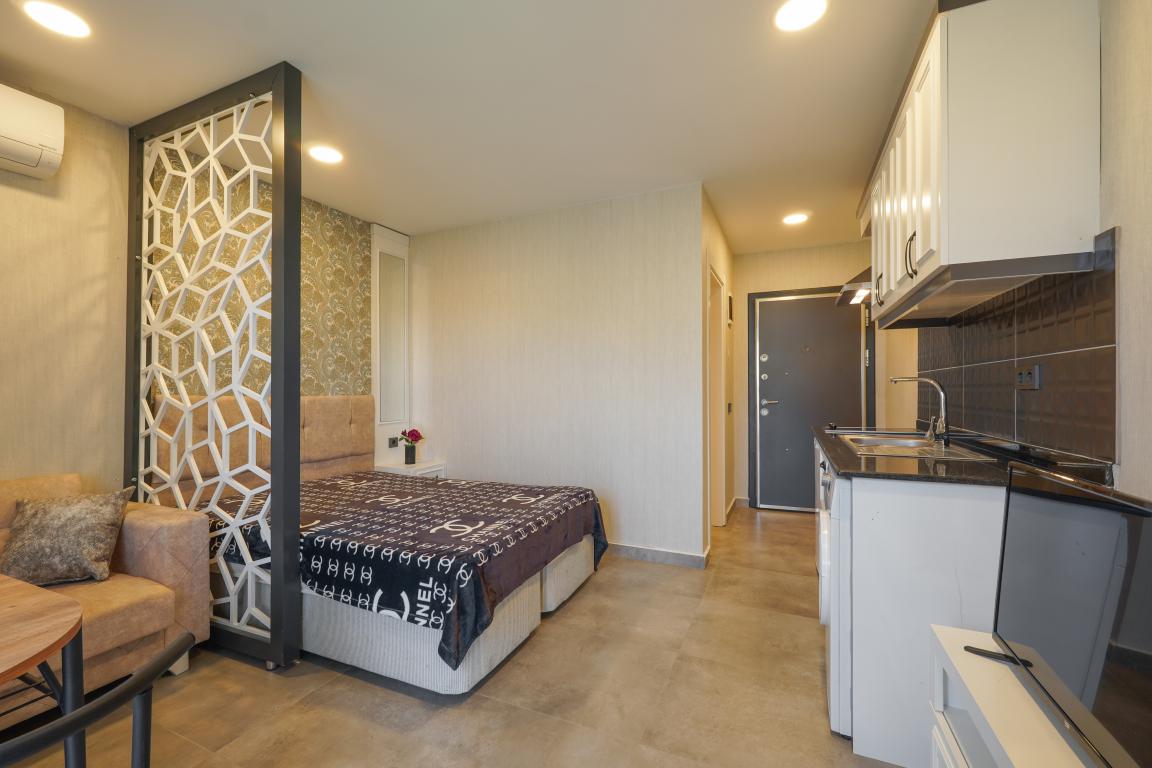 Квартира в Алании 1+0 по выгодной цене в комплексе Stay Suite в районе Каргыджак в Турции - Фото 16