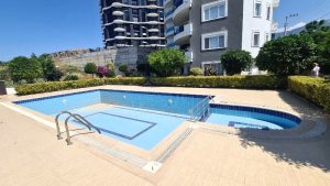 Квартира в Алании 2+1 в комплексе Euro Invest 1 в районе Махмутлар - Фото 2