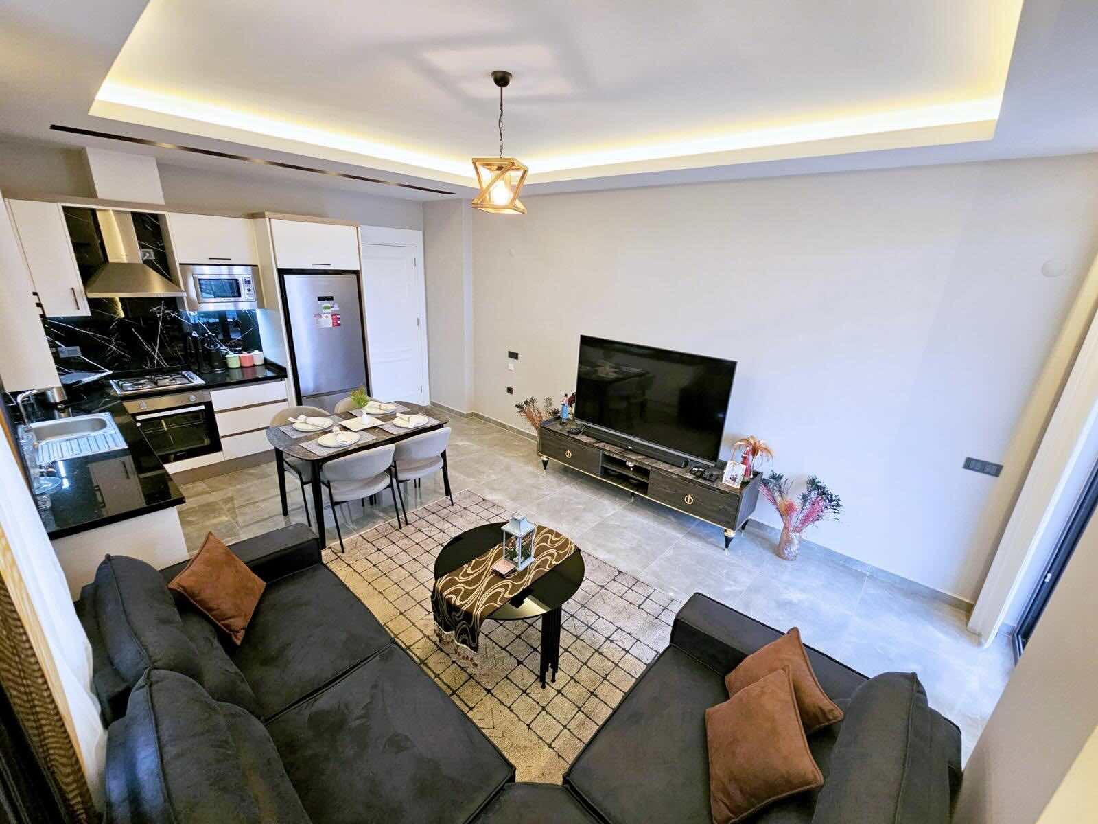 Квартира в Турции 1+1 в комплексе Balkan Tower в Алании в районе Махмутлар - Фото 12