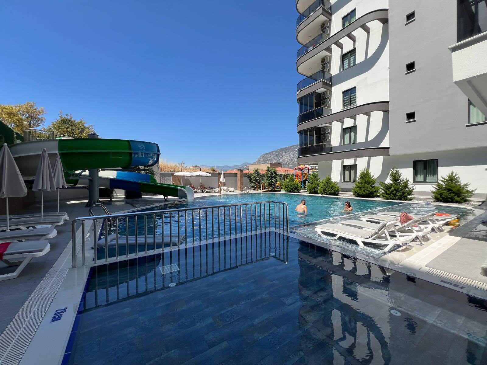 Квартира в Турции 1+1 в комплексе Balkan Tower в Алании в районе Махмутлар - Фото 2