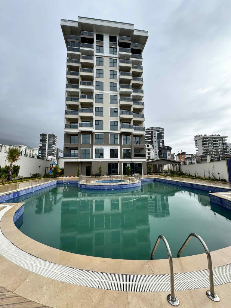 Квартира в Алании 2+1 по отличной цене в комплексе Travok Tower в районе Махмутлар - Фото 2