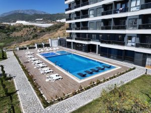 Недорогая квартира в Алании 1+1 в комплексе Milano Pearl в районе Демирташ - Фото 6